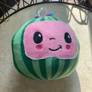 small cocomelon stuffy with window cling
